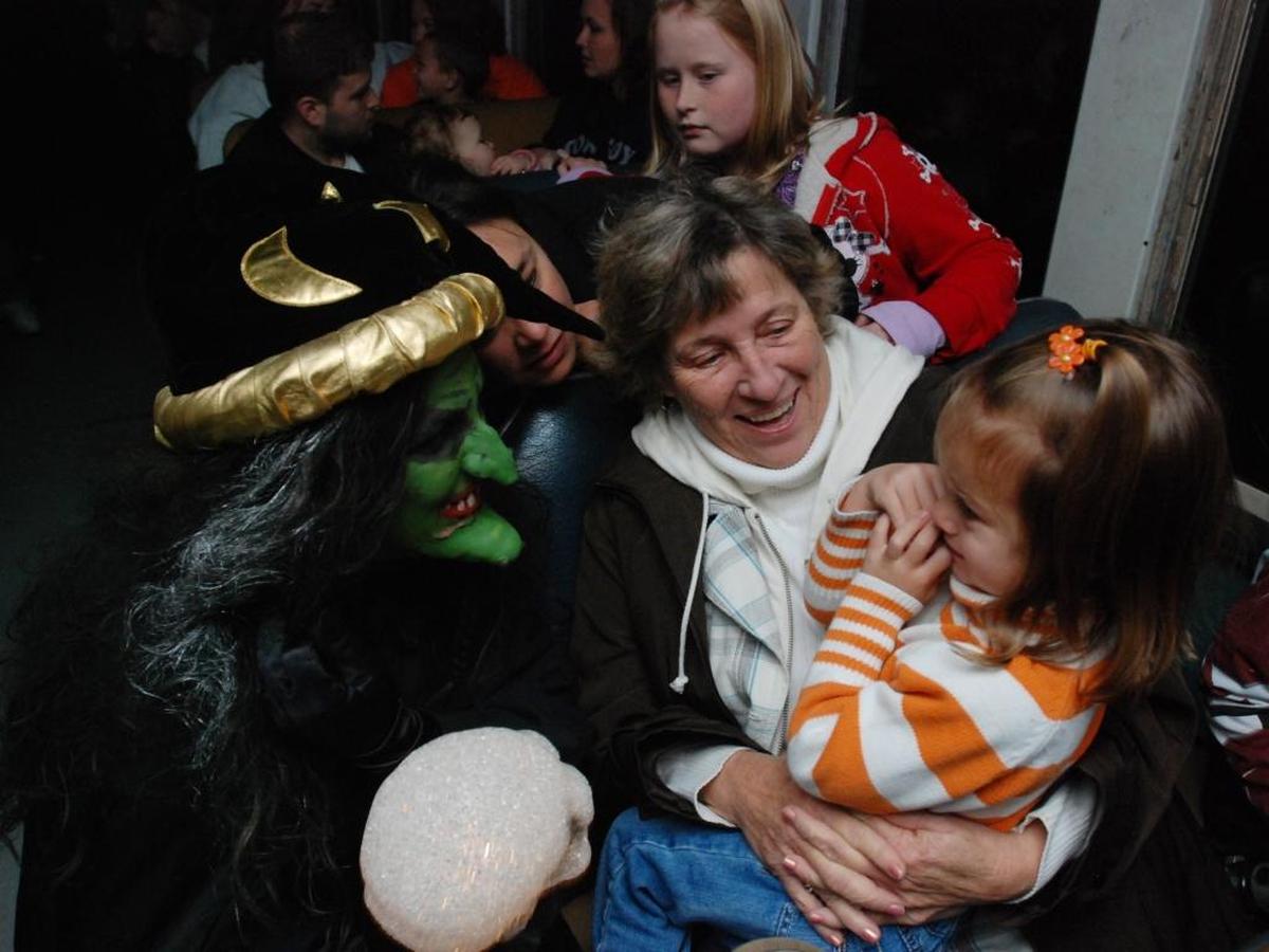 One of Amy Stephens’ (the witch) jobs on the Haunted Train Ride in 2009 was to calm kids who got scared. Here, she talked to Kathleen Smith of Springfield and her granddaughter, Alexandra.