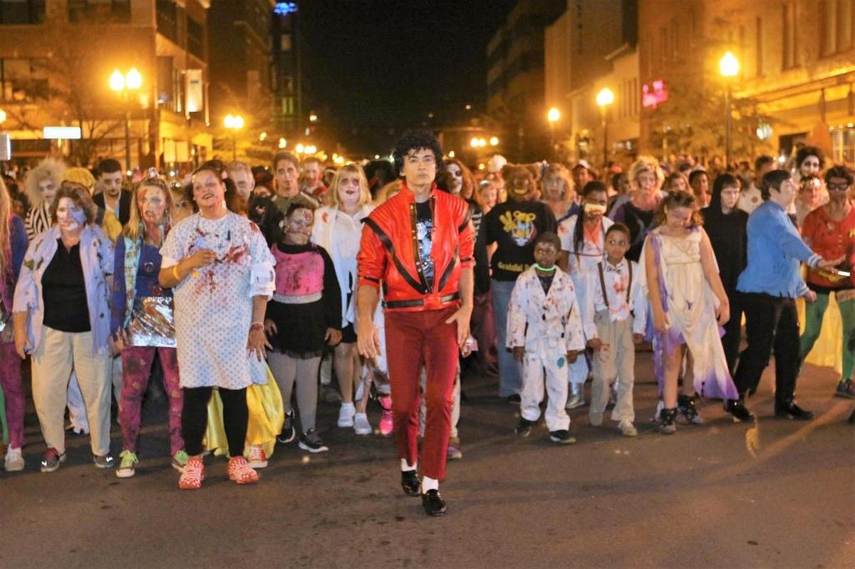 Albert Ignacio as Michael Jackson danced down Main Street in Lexington along with various costumed creatures of the night in 2016.