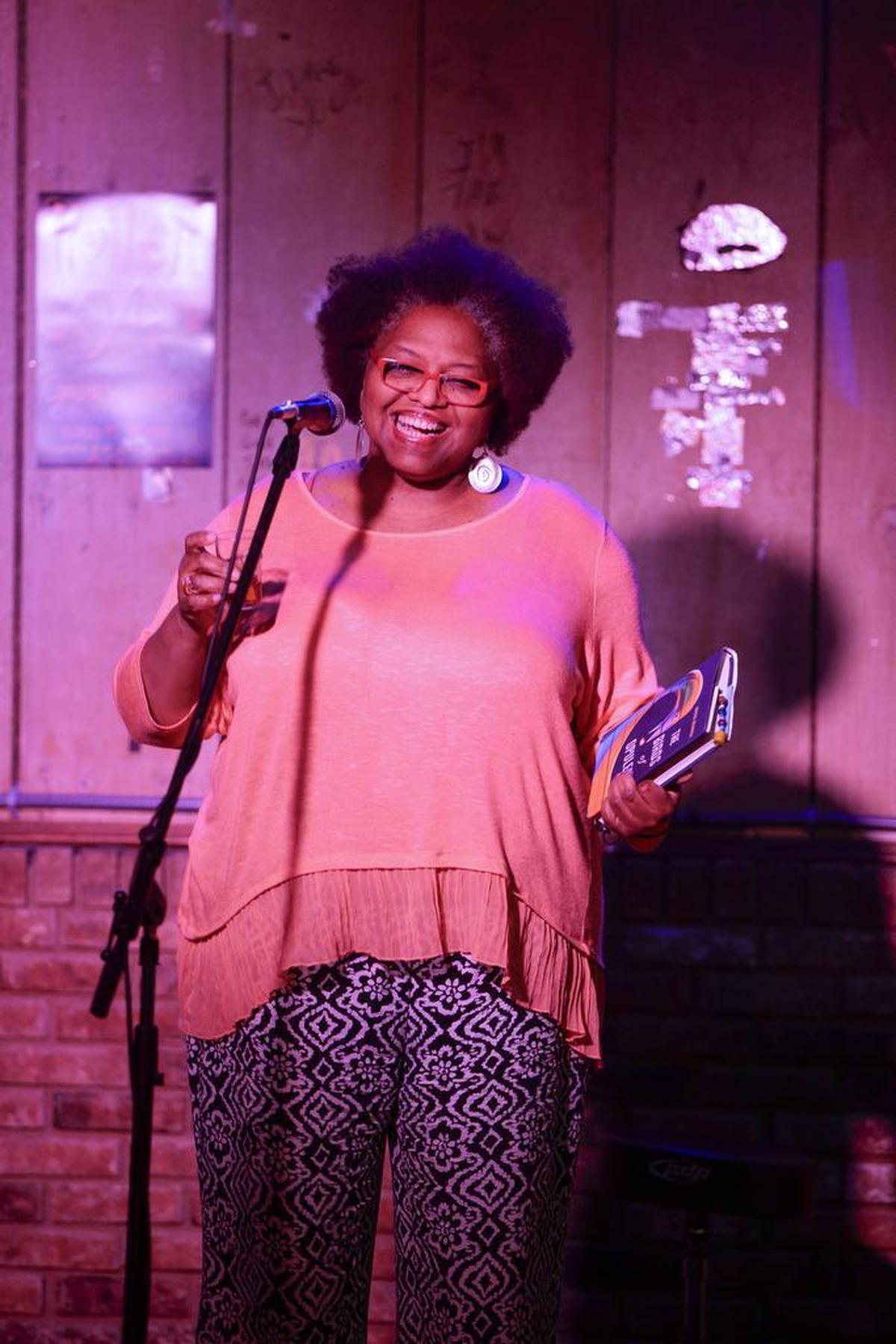 Writer Crystal Wilkinson read from her new book “The Birds of Oppulence” during Holler Poets events at Al’s bar on Wednesday March 31, 2016 in Lexington, Ky. Wilkinson has been named one of Southern Living magazine’s 50 Southerners of the Year.