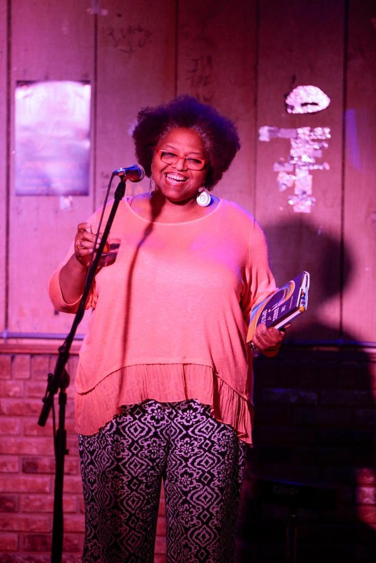 Writer Crystal Wilkinson read from her new book, “The Birds of Opulence,” during a Holler Poets event at Al’s bar in 2016.