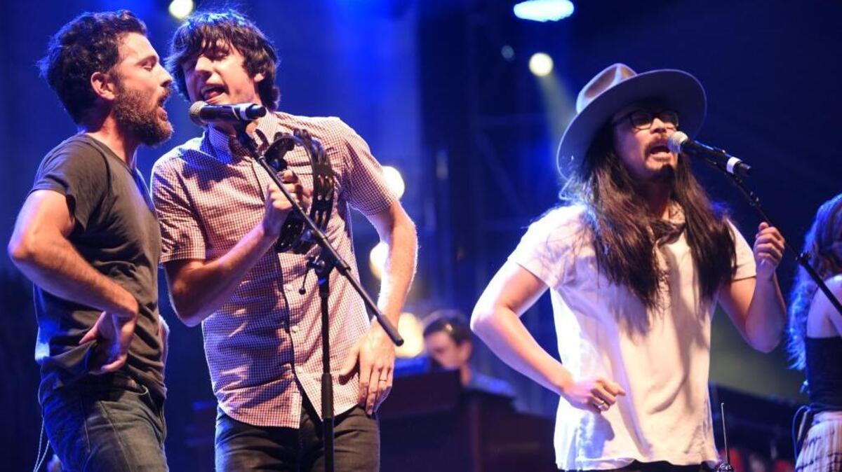 Scott Avett, Seth Avett and Joe Kwon sing “Ain’t No Man” to the Forecastle crowd. The first day of the 2016 Forecastle Festival was July 15, 2016 at Waterfront Park in Louisville, Ky.