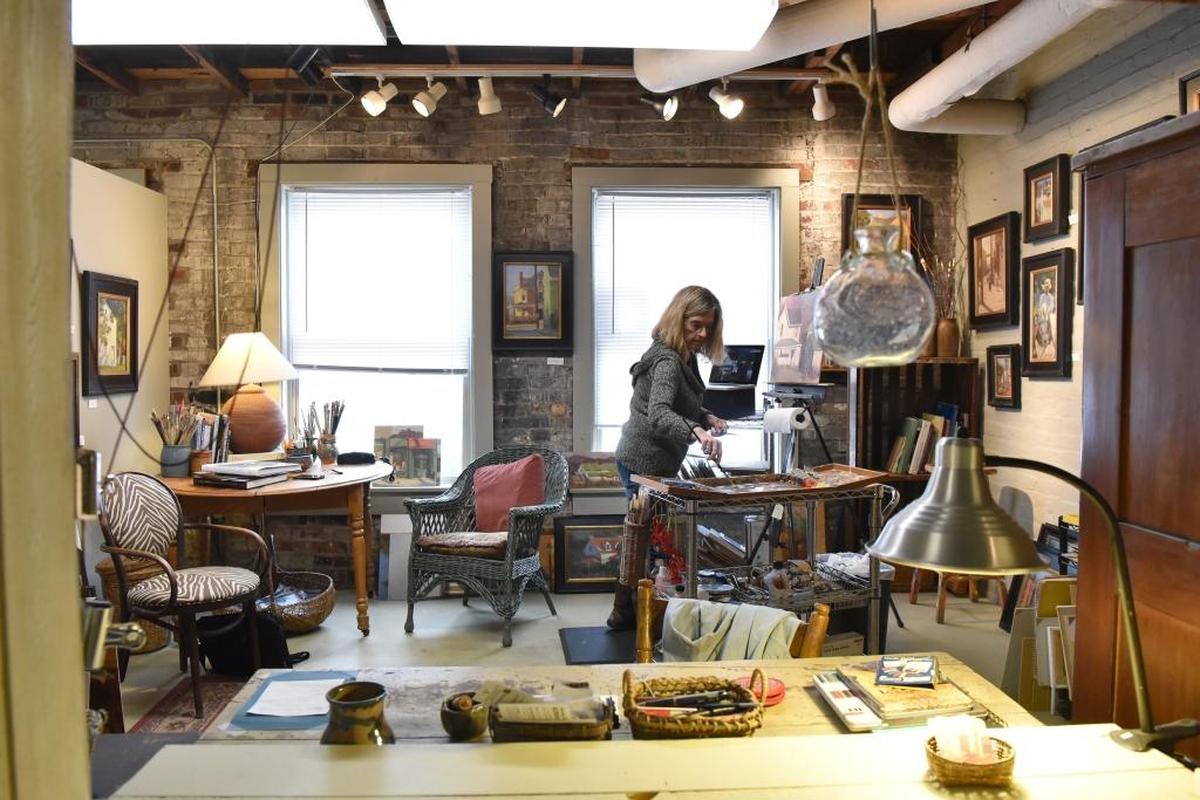 Ann Bass has many scenes of Lexington in her Artists’ Attic studio.