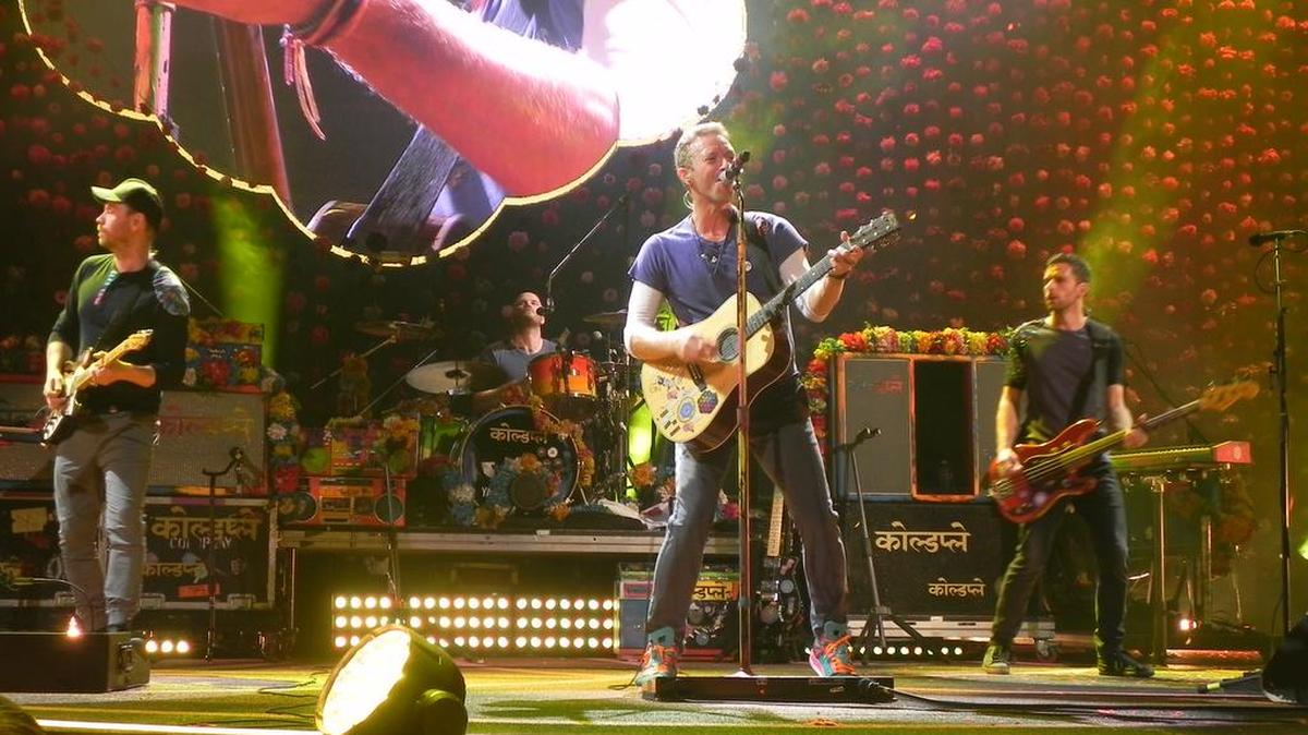 Coldplay on stage at the KFC Yum Center in Louisville on July 27, 2016.