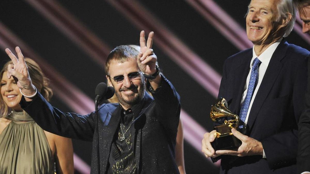 Ringo Starr, center, and Beatles producer Sir George Martin accepted the Grammy Award for best compilation soundtrack album award in 2008 for “Love.”