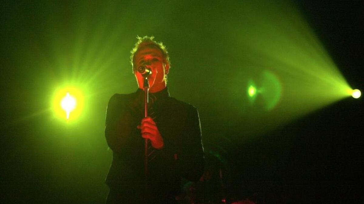 Stone Temple Pilots lead singer Scott Weiland sings to a packed house at the Louisville Palace on wednesday May 1,2002 in Louisville, Ky.