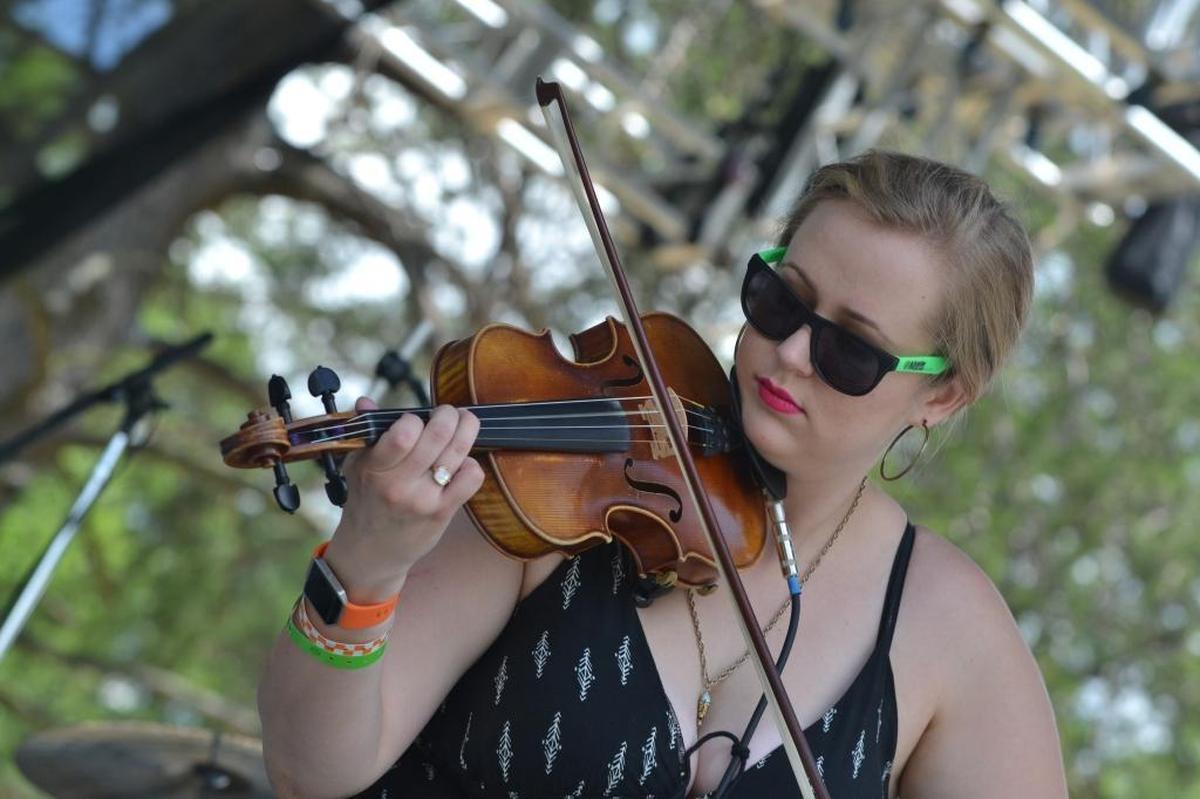 Maggie Lander plays fiddle with The Rooster’s Crow at the 2017 Master Musicians Festival. The group plays the Crave Food + Music Festival Saturday.