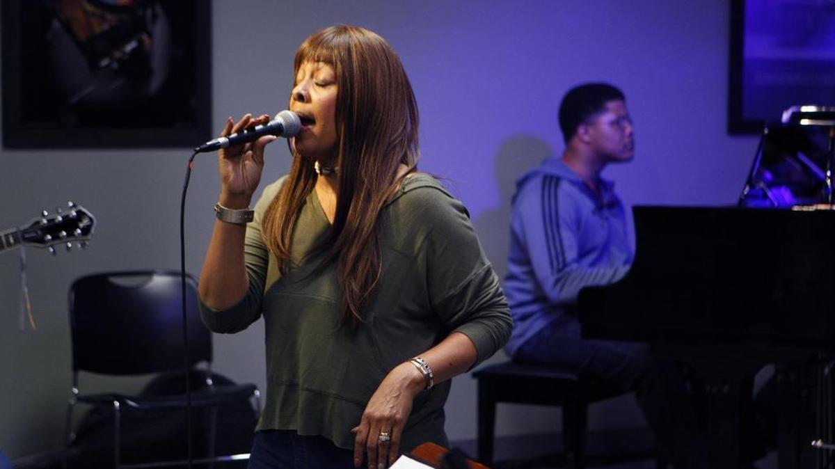 Jessie Laine Powell rehearses with her band last week at Willis Music in Lexington.