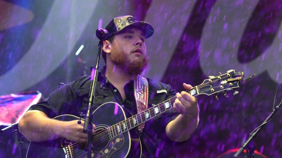 Luke Combs plays "When It Rains It Pours" in appropriate weather. His big hit is "Hurricane." The first day of Red, White & Boom 2017 took place at Whitaker Bank Ballpark in Lexington, Kentucky under heavy rains from the remnants of Hurricane Harvey.