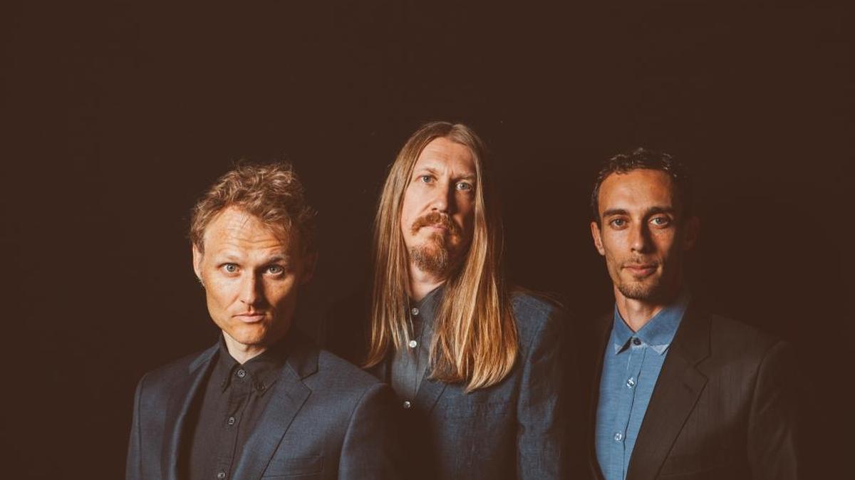 The Wood Brothers are Chris Wood, Oliver Wood and Jano Rix.
