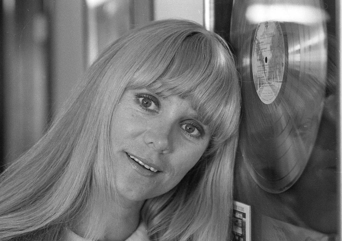Singer-songwriter Jackie De Shannon poses next to a gold record in her publicist's office in Studio City, Los Angeles, Calif., in March 1980.