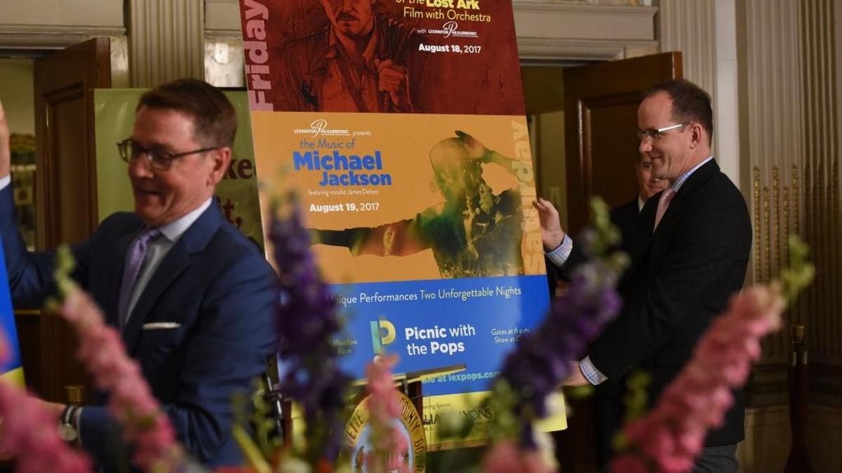 Lexington Mayor Jim Gray and Lexington Philharmonic Music Director Scott Terrell reveal posters for the 2017 Picnic with the Pops lineup on April 18, 2017 in the lobby of the Kentucky Theatre.