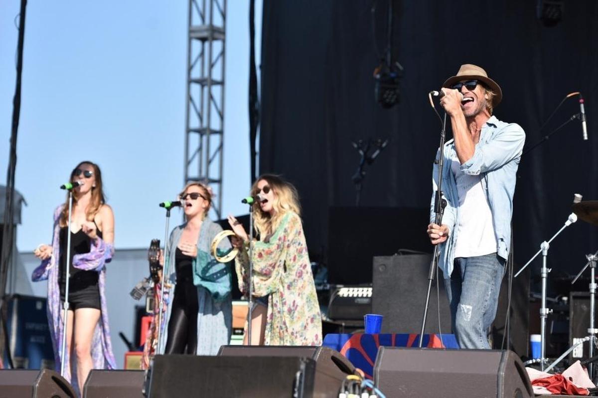 Todd Snider and the backing vocalists of the East Side Bulldogs on stage at the MoonTower Festival. The 2017 MoonTower Music Festival was Aug. 26, 2017 at Masterson Station Park in Lexington, Kentucky.