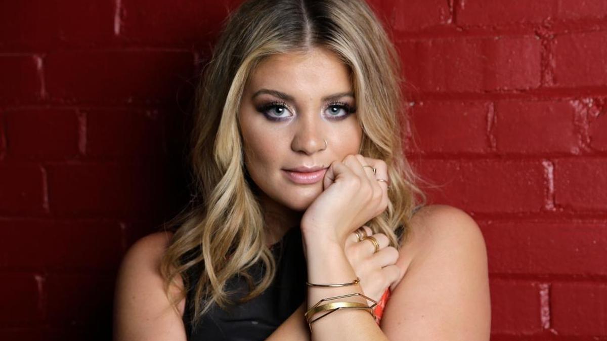 After years of personal and professional struggles, Lauren Alaina has her first No. 1 country song.