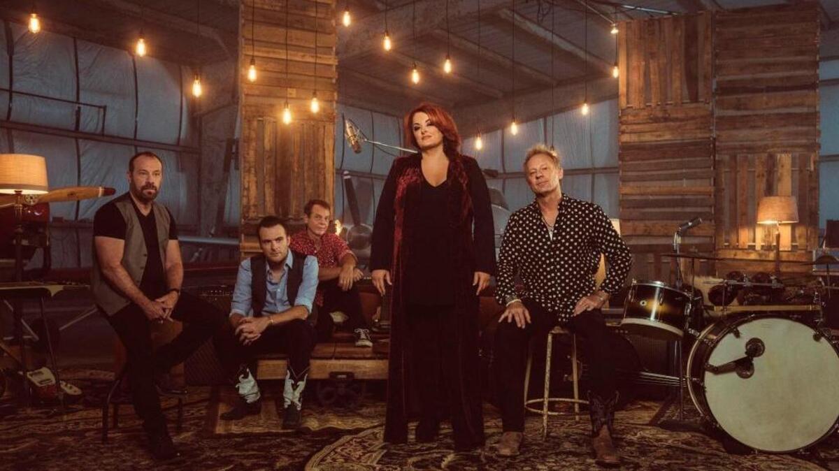 Wynonna & The Big Noise, from left: Dow Tomlin, bass; Justin Weaver, guitar; Peter King, keyboards; Wynonna Judd, vocals; and her husband, Cactus Moser, drums.