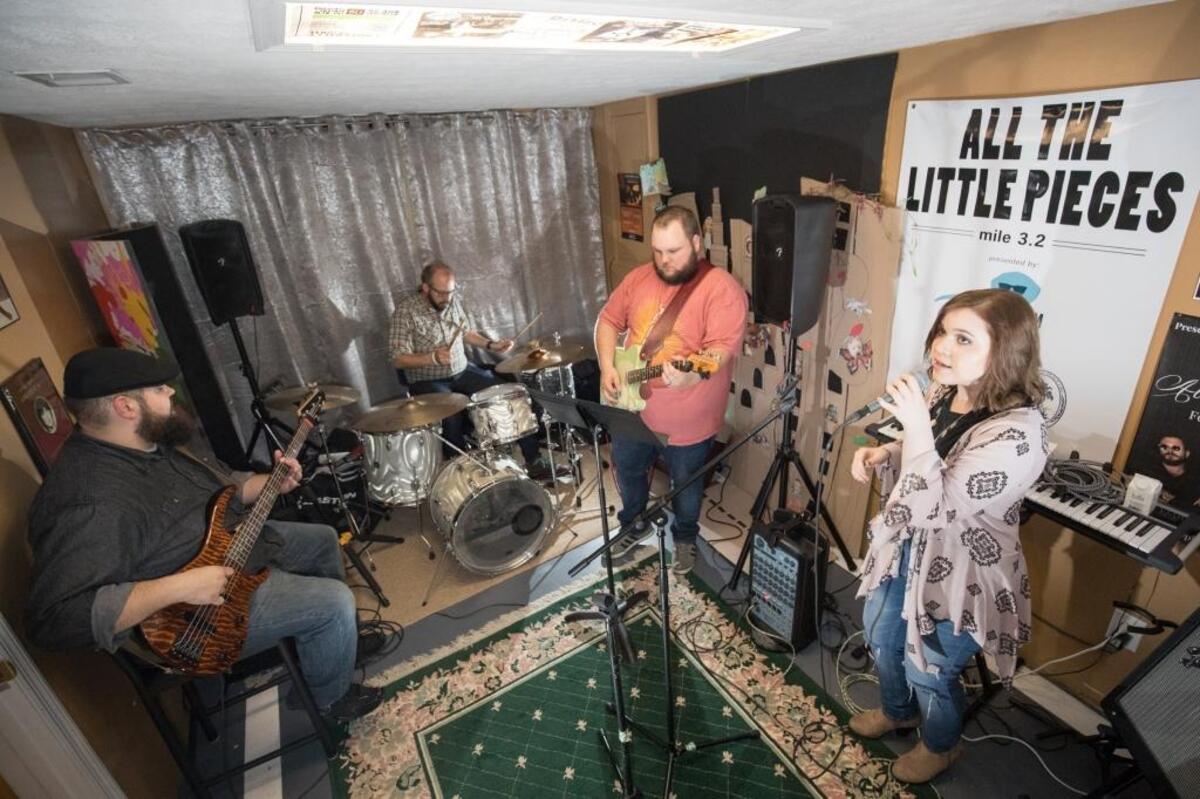 Bass player Billy P. Thomas, left, drummer Matt Halvorson, guitar player Zach Lafferty, and lead Rhyan Sinclair. All the Little Pieces rehearsed on Thursday Oct. 20, 2016 in Lexington, Ky.