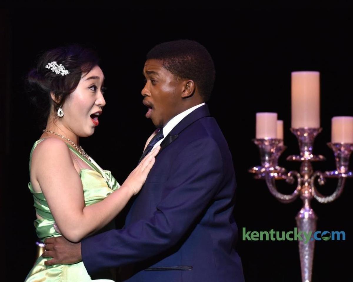 Violetta (Junghyun Lee) and Alfredo (Thabang Masango) declare their love for each other in the University of Kentucky Opera Theatre’s production of Giuseppe Verdi’s “La Traviata.”
