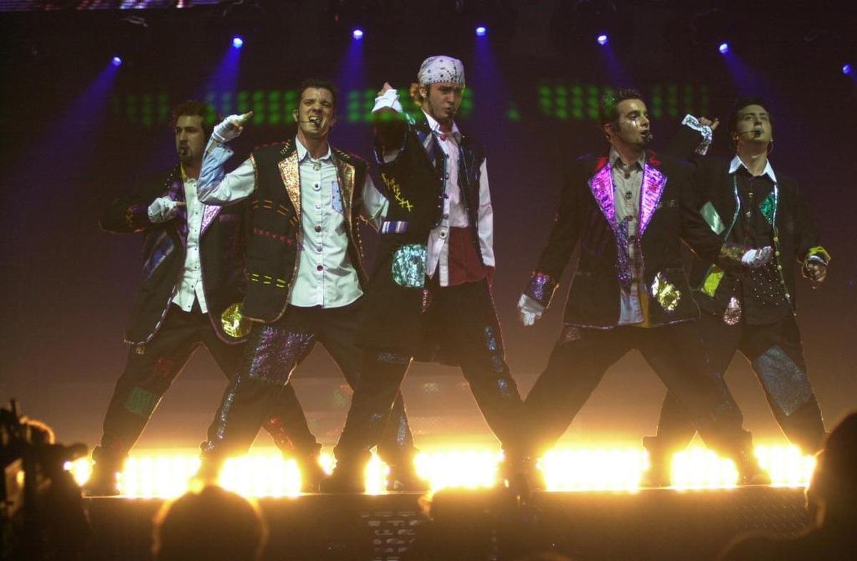 NSYNC — Joey Fatone, Jr. J.C. Chasez, Justin Timberlake, Chris Kirkpatrick, and Lance Bass — on stage at Rupp Arena on June 26, 2000.