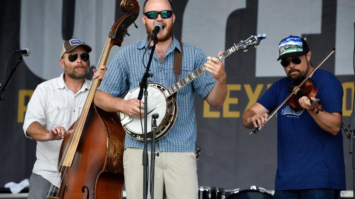 Roddy Puckett, Arthur Hancock and Jesse Wells on stage at Crave. The Wooks played the second day of the Fourth Annual Crave Lexington Music and Food Festival on Aug. 16, 2016 at Masterson Station Park in Lexington, Kentucky. In July, The Wooks too first place in the RockyGrass band competition in Lyons, Colorado.