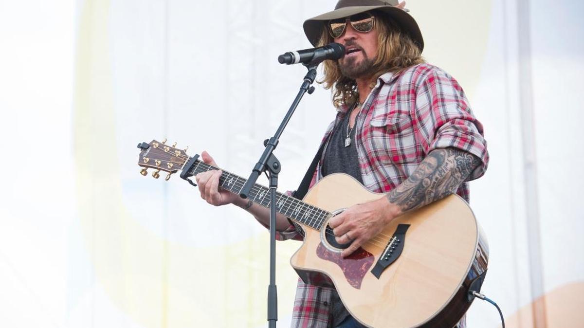 Billy Ray Cyrus performs at the 2014 CMA Music Festival in Nashville.