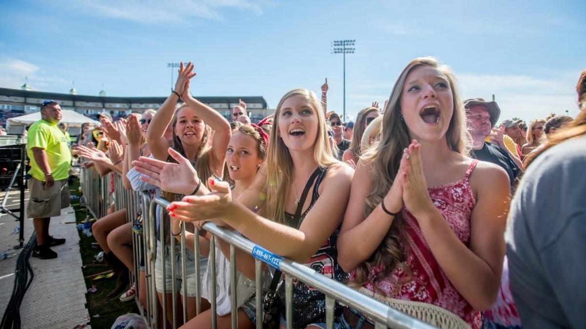 From left, Laken Semones, Taylor Harrod, Jordan Charles and Madison Fitzgerald attended the Red, White and Boom country music festival in 2014.