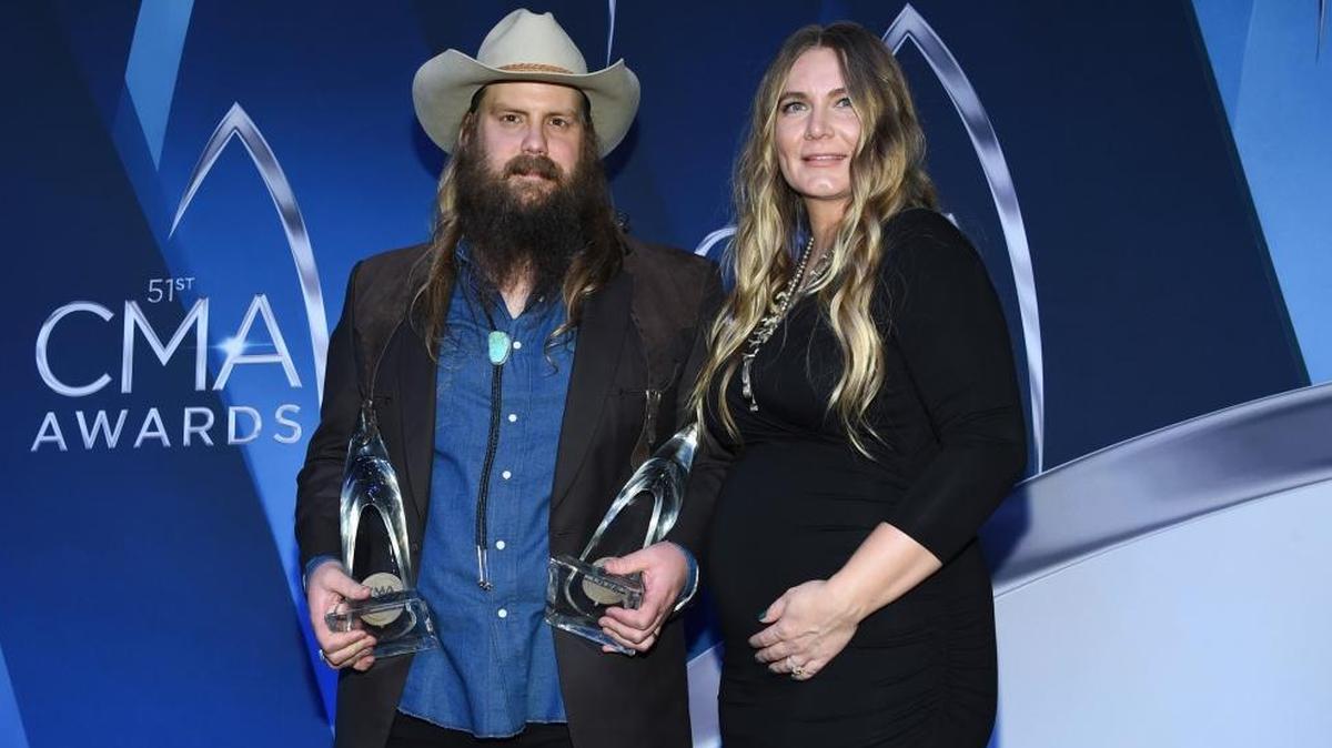 Chris Stapleton and his wife, Morgane Stapleton, with CMA awards for album of the year and male vocalist of the year in early November.