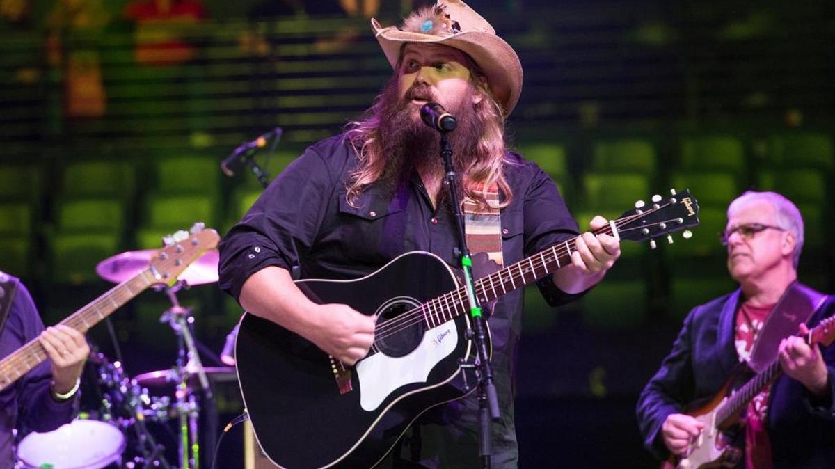 Chris Stapleton performs at Charlie Daniels 80th Birthday Volunteer Jam at Bridgestone Arena on Wednesday, Nov, 30, 2016, in Nashville, Tenn. He will perform on Dolly Parton’s telethon to raise funds for victims of the Smoky Mountain wildfires Tuesday night.