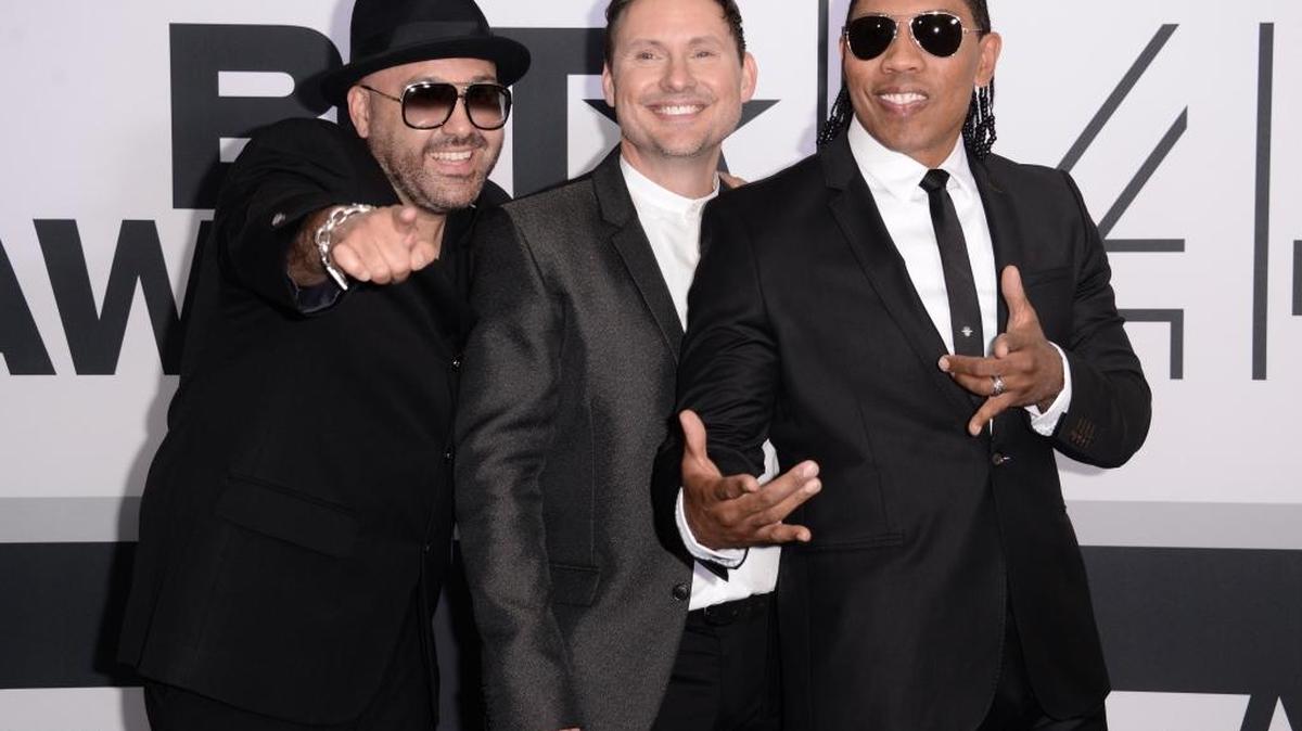 Mark Calderon (left) with fellow Color Me Badd members Martin Kember and Kevin Thornton at the 2014 BET Awards. Calderon, fellow group founder Bryan Abrams and vocalist Adam Emil will perform as the band when the “I Love the’90s” tour stops at Rupp Arena April 8.