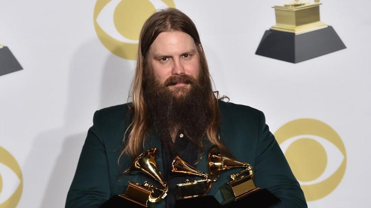 Chris Stapleton displayed his Grammy awards for best country solo performance, best country song and best country album.