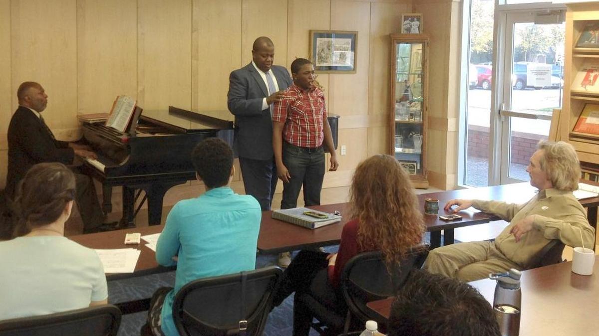 UK Opera Director Everett McCorvey works with UK senior Thabang Masango in studio a few days before he performs for the 2015 Kentucky District round of the Metropolitan Opera National Council Auditions. Cliff Jackson accompanies Masango on piano. Masango will return to the competition Nov. 12 at First Presbyterian Church in Lexington.
