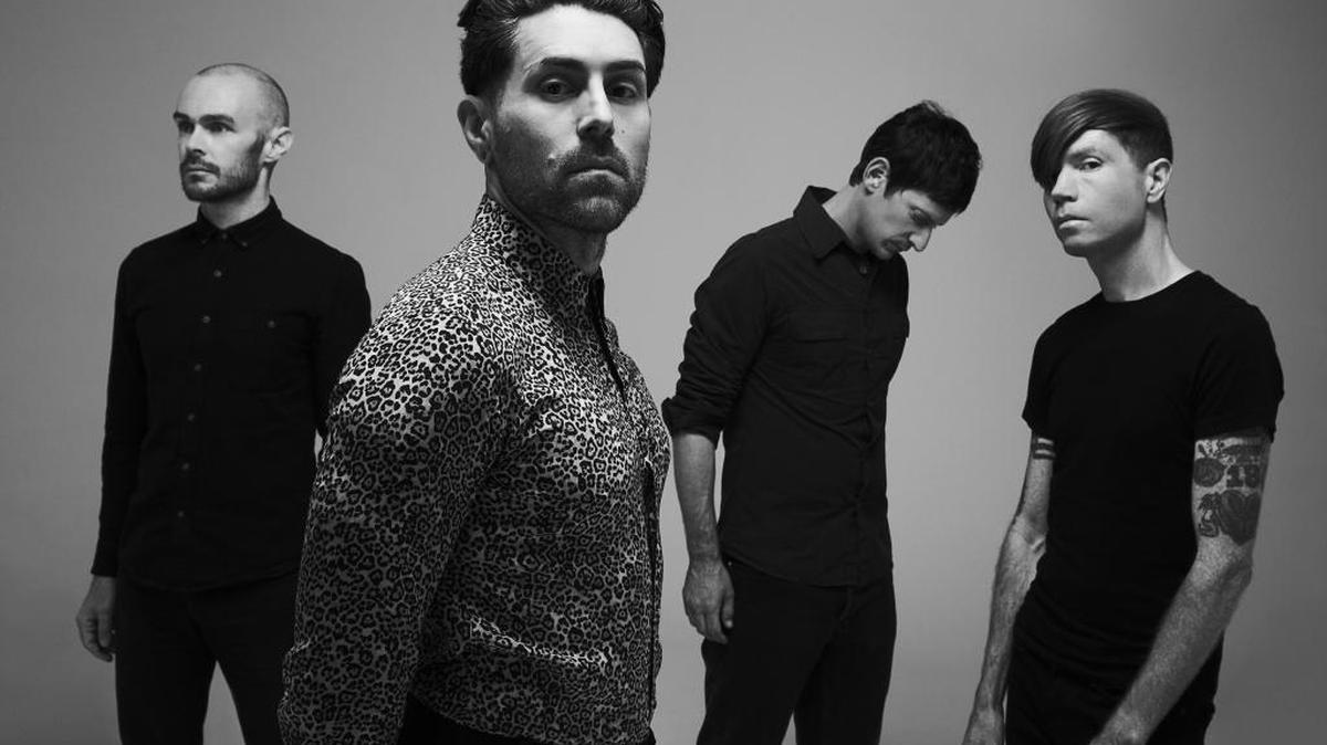 AFI is Hunter Burgan, Davey Havok, Adam Carson and Jade Puget.