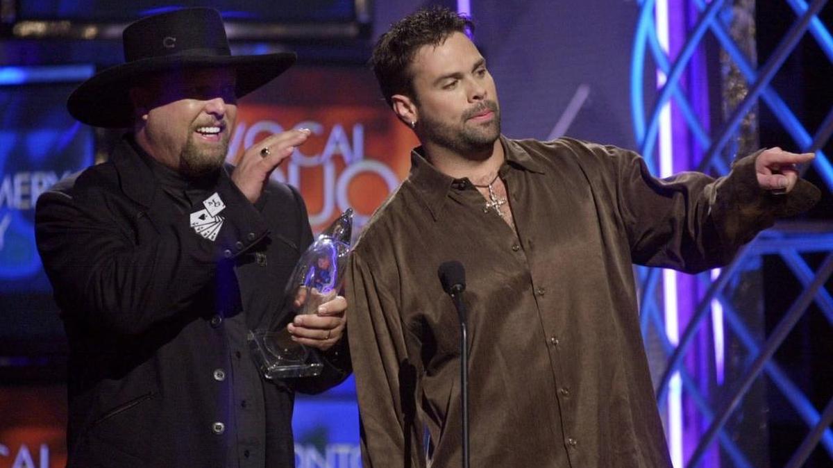 Eddie Montgomery, left, and Troy Gentry of the Country music duo Montgomery Gentry accept their award for vocal duo of the year at the Country Music Association Awards show on Wednesday, Oct. 4, 2000 at the Grand Ole Opry House in Nashville, Tenn. Gentry, who died Friday in a helicopter crash, will be remembered in a celebration at the Opry on Sept. 14.
