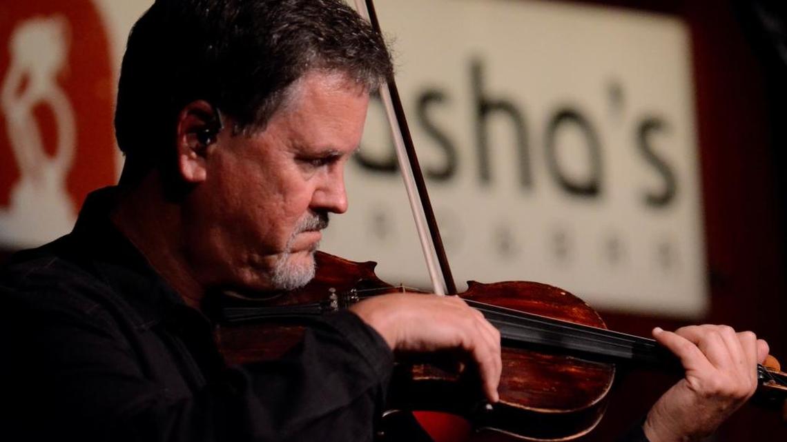 Fiddler Mike Hartgrove with Lonesome River Band at Natasha's Bistro & Bar during the Best of Bluegrass Festival on June 9.