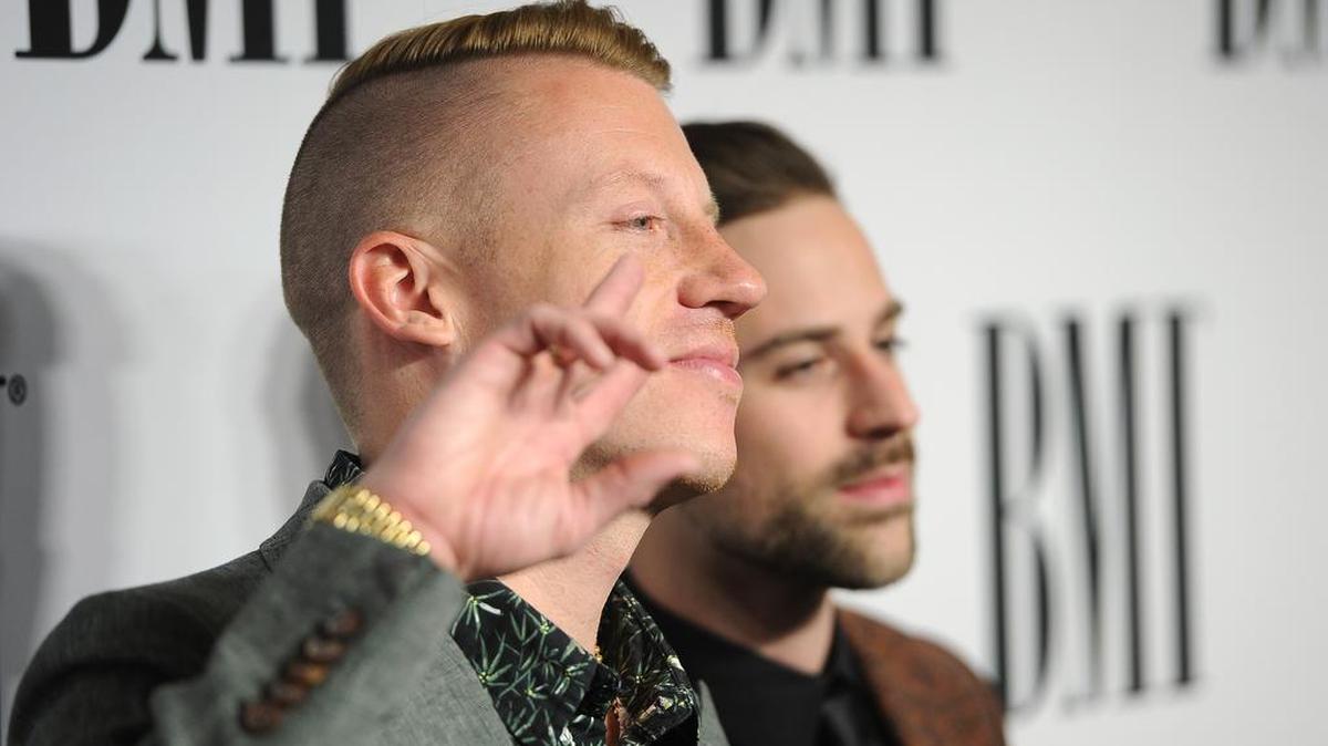 Macklemore, left, and Ryan Lewis arrive at the 62nd Annual BMI Pop Awards at the Beverly Wilshire Hotel on Tuesday, May 13, 2014, in Beverly Hills, Calif.