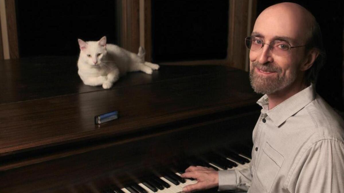George Winston comes to the Grand Theatre Frankfort April 13.