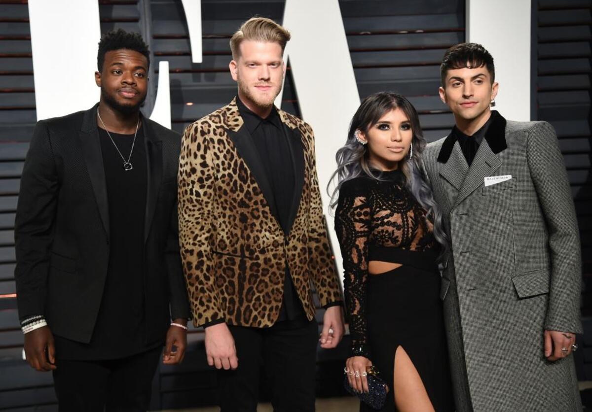 Pentatonix members, from left, Kevin Olusola, Scott Hoying, Kirstin Maldonado, and Mitch Grassi arrive at the Vanity Fair Oscar Party earlier this year.