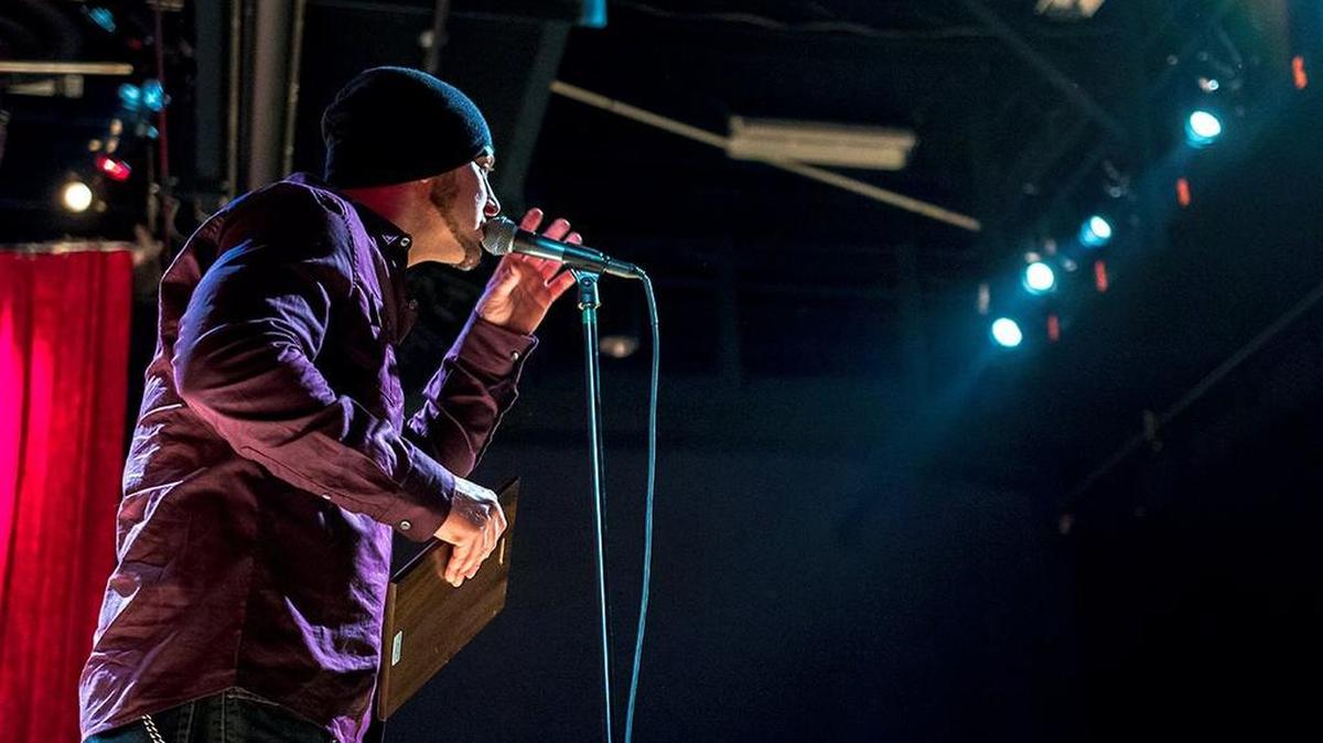 Hybrid the Rapper accepts his award for best hip hop at the first annual Lexington Music Awards.