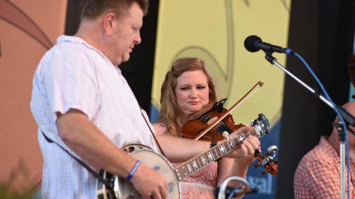 Jr Williams and Kati Penn of Lexington-based NewTown play the first of two sets at Festival of the Bluegrass June 9, 2017. The 44th annual Festival of the Bluegrass is June 8 to 11 at the Kentucky Horse Park Campground in Lexington, Kentucky.