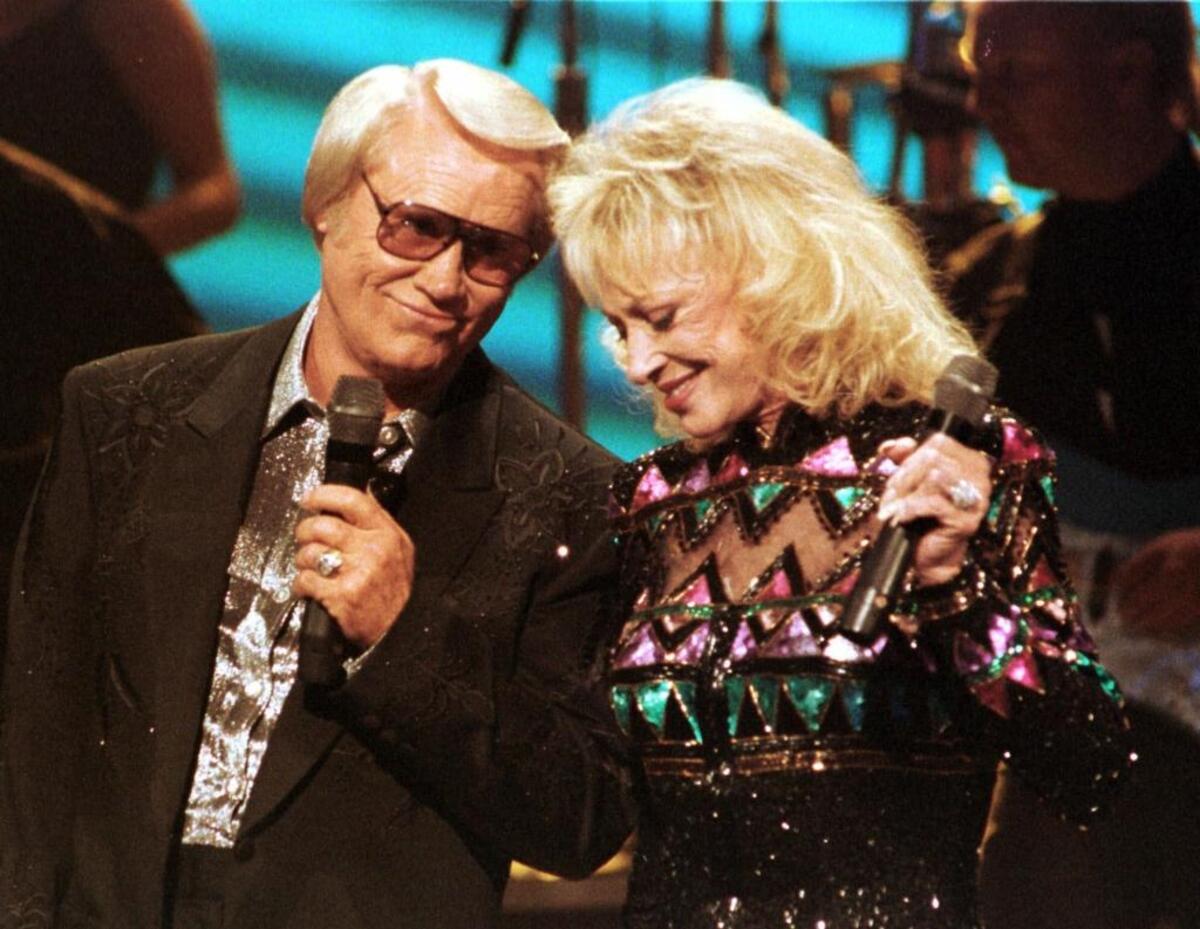 Tammy Wynette appears with duet partner and former husband George Jones in Nashville, Tenn. in Oct. 5, 1995.