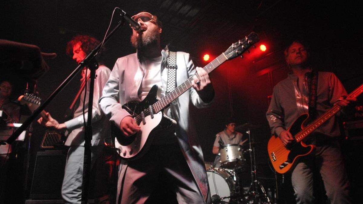 The Apples in stereo guitarist John Hill, frontman Robert Schneider, drummer John Dufilho and bassist Eric Allen performed at Cosmic Charlie’s former location on Woodland Avenue in April 2010. The club has relocated to 723 National Avenue and opens Dec. 1.
