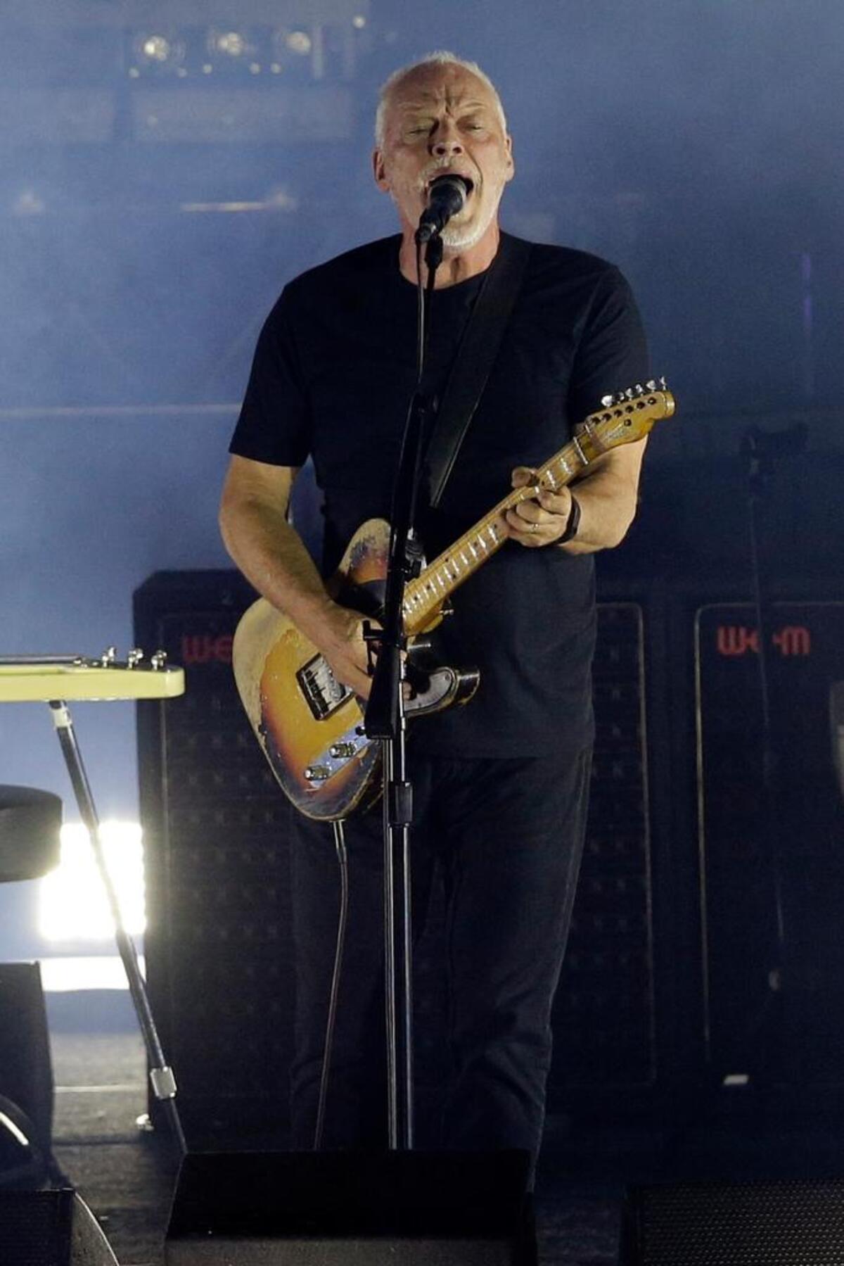 David Gilmour performs in the ancient roman amphitheater of the Pompeii archeological site, Italy, Thursday, July 7, 2016.