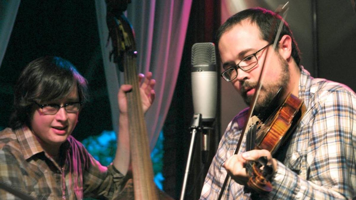 J.T. Cure, left, and Jesse Wells perform at the Grounds and Sounds restaurant in Morehead in 2006.
