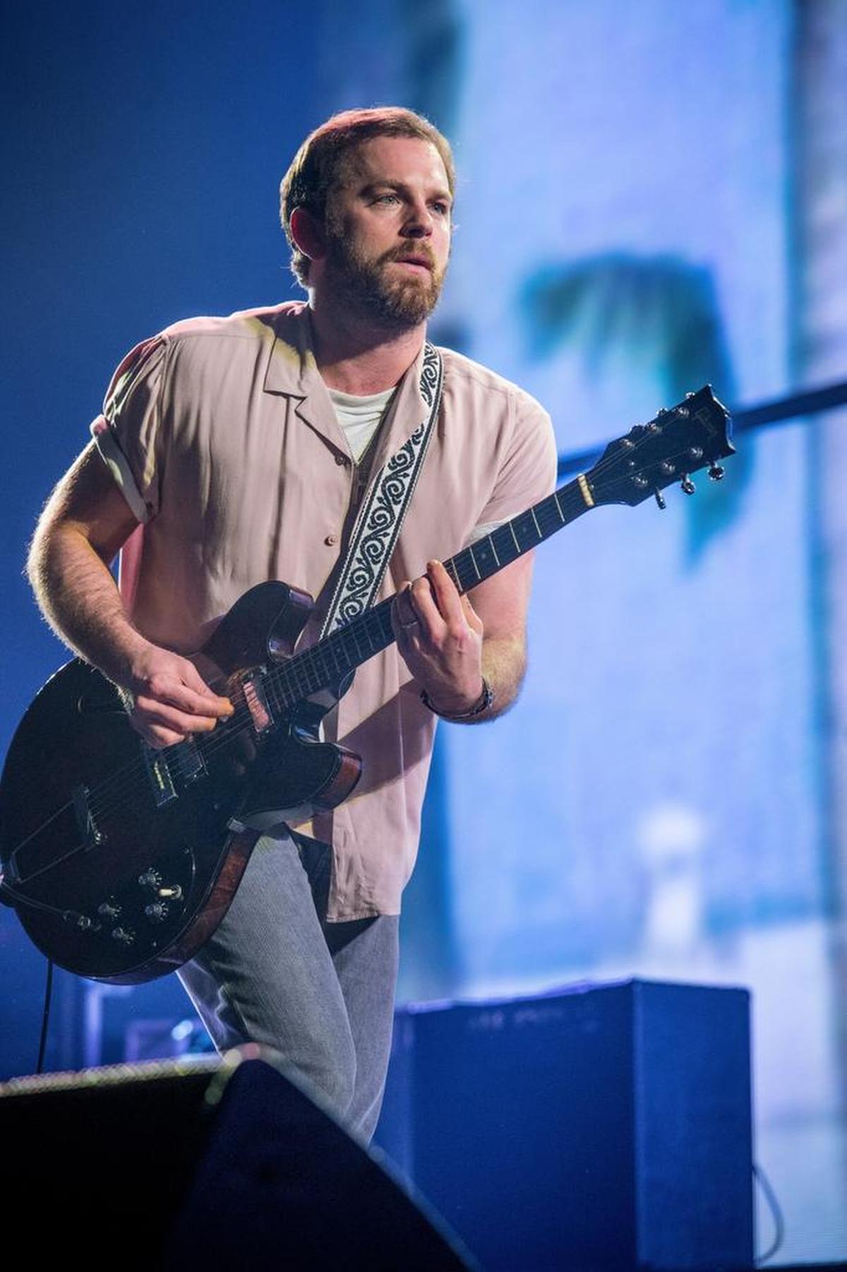 Caleb Followill of Kings Of Leon performs at the 2016 KROQ Almost Acoustic Christmas at The Forum on Saturday, Dec. 10, 2016, in Inglewood, Calif. The band is at the KFC Yum! Center in Louisville.