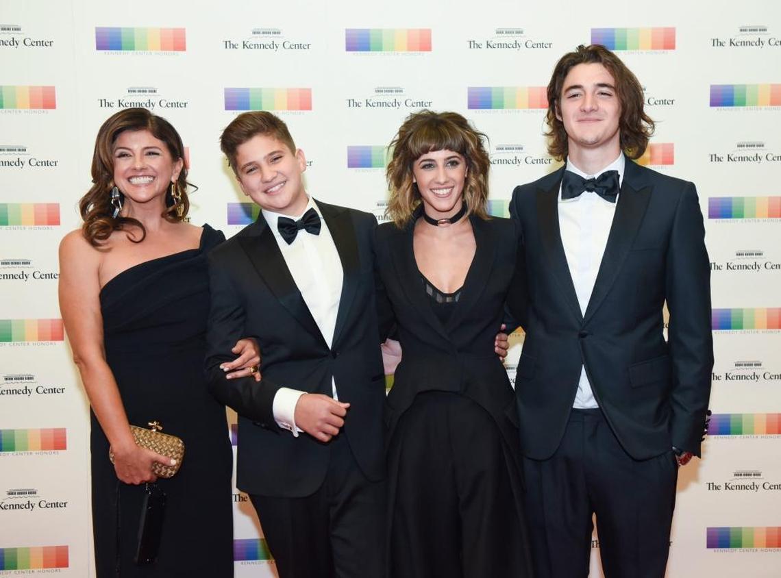 The family of Eagles band member Glenn Frey, from left, wife Cindy Frey, Otis Frey, Taylor Frey, and Deacon Frey arrive at the State Department for the Kennedy Center Honors gala dinner on Saturday, Dec. 3, 2016 in Washington. Deacon Frey is now on tour with the Eagles.