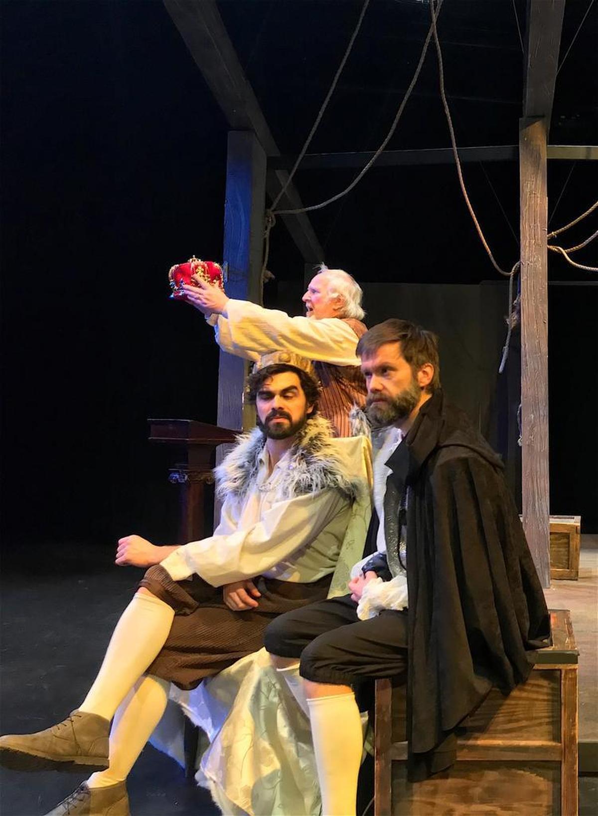 Samuel Lockridge (left) as King James I, Shayne Brakefield (right) as Sir Robert Cecil, and Anthony Haigh (back) as Macbeth in AthensWest Theatre Co.’s production of Bill Cain’s “Equivocation,”