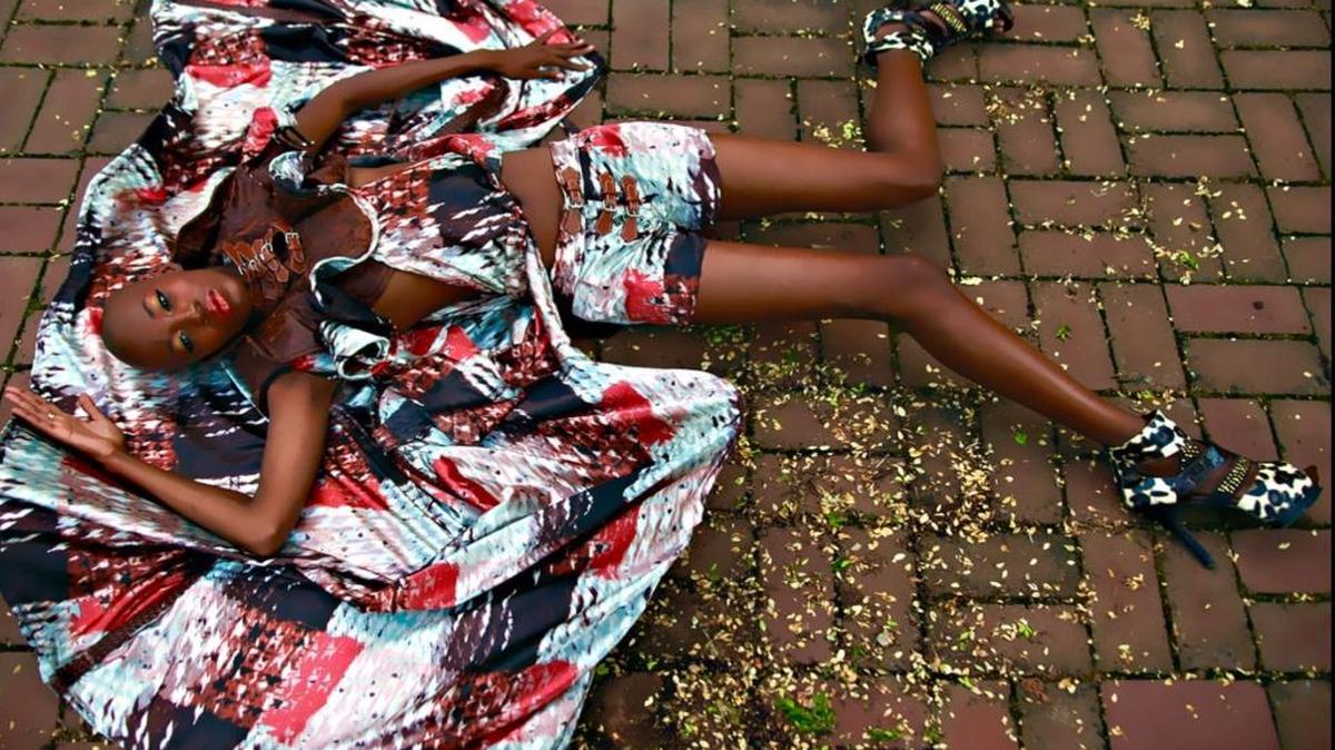 Natira Simone Harvin, daughter of designer Chandra Peyton, modeled shorts and a top in a graphic print from Dauphine of France Couture.
