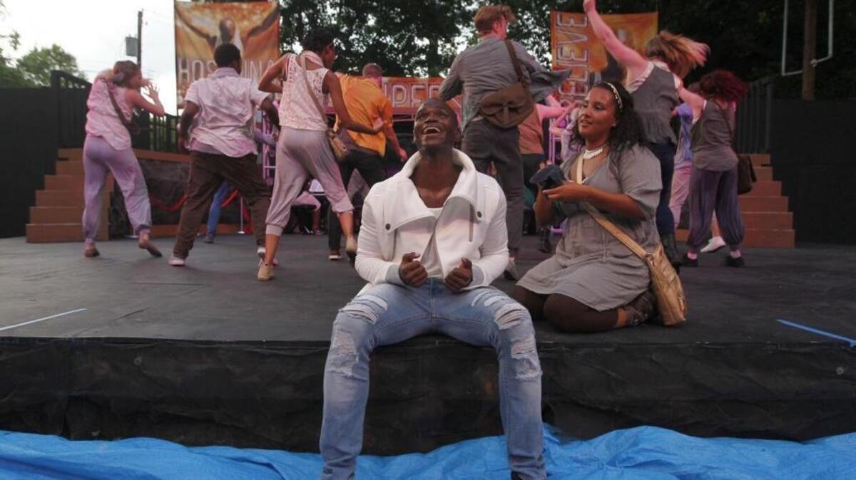 Darian Sanders as Jesus and Navji Dixon as Mary rehearsed a scene of “Jesus Christ Superstar.”