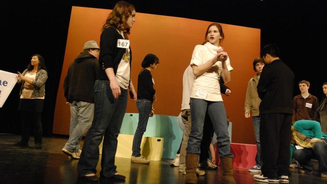 In this 2010 file photo, Susan Creech as Katherina and Kayla Brown as Bianca rehearse while other members of the cast and crew mark off where platforms will go. Paul Laurence Dunbar High School presented its 1950s version of William Shakespeare’s “Taming of the Shrew” as part of the 2010 Southeastern Theatre Conference’s high school play festival.