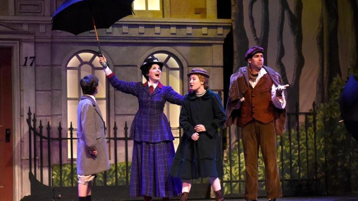 Michael (David Hensley), Mary Poppins (Christina DeCicco), Jane (Alexandra Simpson) and Bert (Denis Lambert) at the end of a busy day. The Lexington Theatre Company presents "Disney's Mary Poppins" July 14 to 17 at the Lexington Opera House, 401 West Short Street in Lexington, Kentucky. This photo was taken at a technical rehearsal on July 11, 2016.