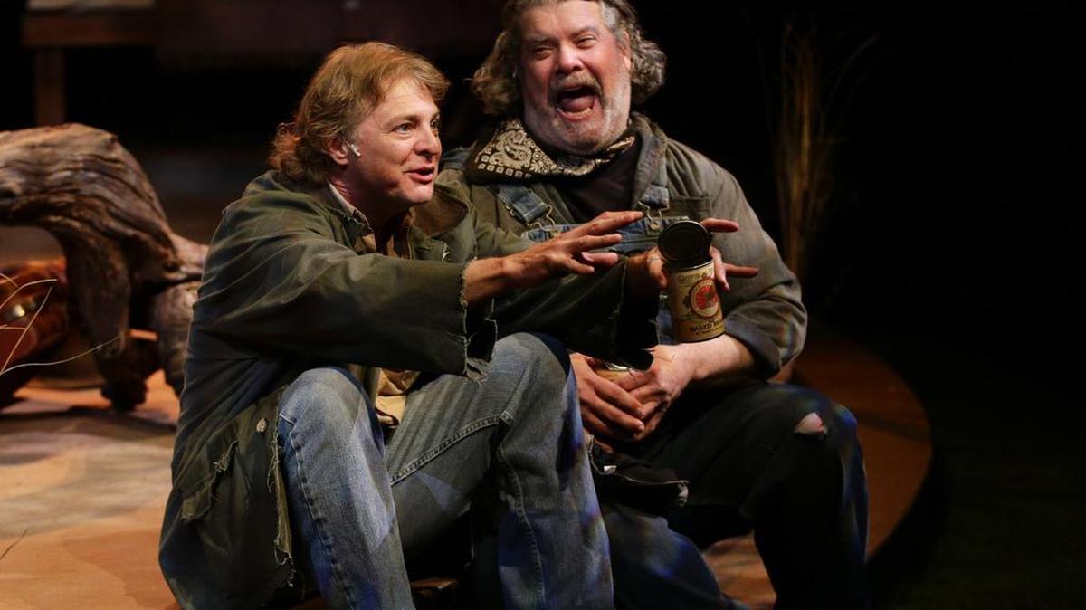Kevin Hardesty, left, plays George, and Walter Tunis is Lennie in Woodford Theatre’s “Of Mice and Men.”