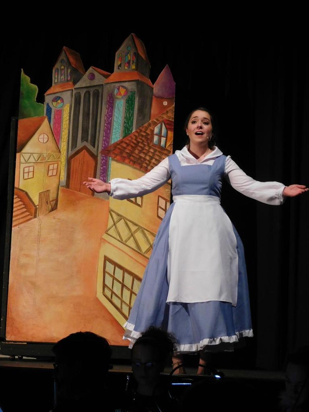 Hanna Brewer as Belle in Tates Creek Drama’s production of “Beauty and the Beast,” playing through Nov. 19.